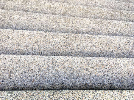 Gray staircase pattern design top view. Grainy and small stone surface texture background.の写真素材