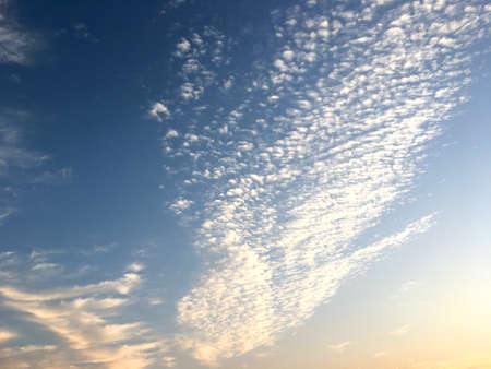 Beautiful blue sky and white cloud on sunset in the twilight time. Color shade of nature background.