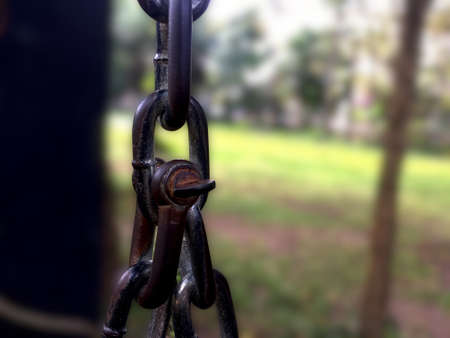 Rust chain and joint for swing in the garden.の写真素材