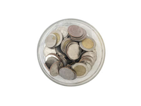 Coins inside transparent glass bottle for saving or business concept isolated on white background.