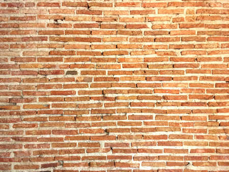 Orange brick wall with concrete background.の写真素材