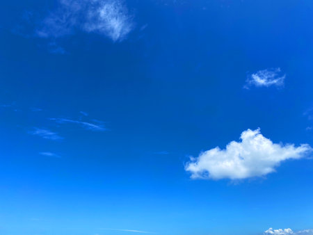 Beautiful blue sky and white cloud in the afternoon time. Color shade of nature background.の写真素材