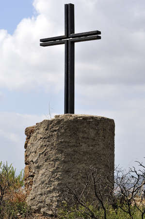 cross on top of the mountain of Montornesの写真素材