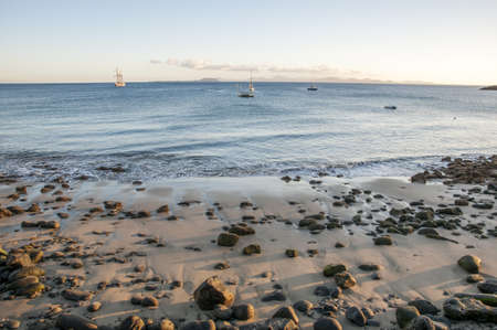 stone beach where the sea is Lanzaroteの写真素材