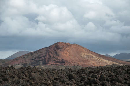 alien landscape of Lanzarote where we observe the stone desertの写真素材