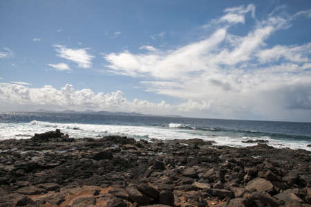 rocky beach where the waves observed