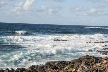 rocky beach where the waves observed
