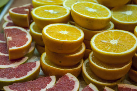 mixed fruits like oranges and grapefruitの写真素材