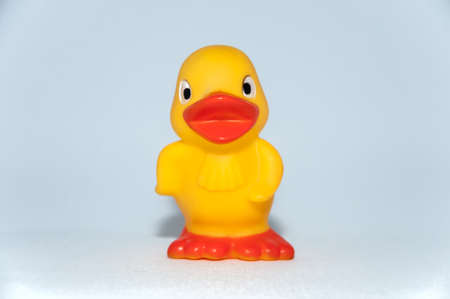 toy duck yellow with orange beakの写真素材