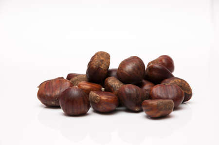 chestnuts to eat in autumn on a white backgroundの写真素材