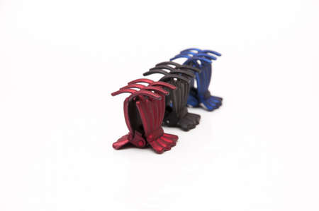 tweezers to pick the hair color of the headの写真素材