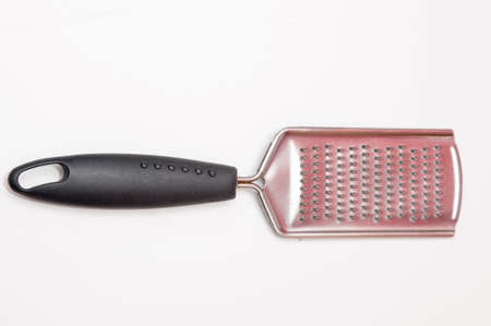stainless steel grater to grate cheese or other foodの写真素材