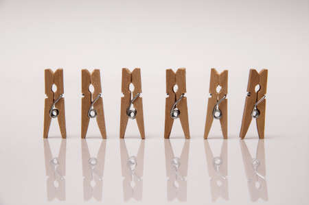 small wooden clamps to attach several sheets of paper