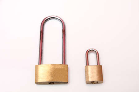 lock with keys to close the bags on a white background