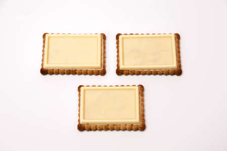 white chocolate cookies on a white backgroundの写真素材