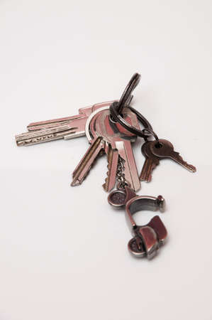 Door keys on a white backgroundの写真素材