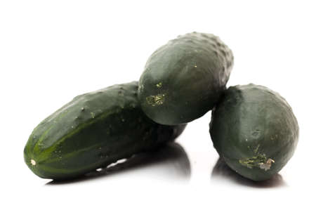 green cucumber on a white backgroundの写真素材