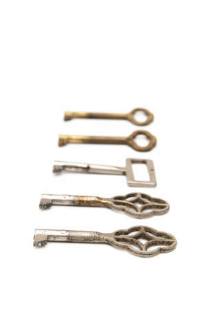 old keys on a white backgroundの写真素材