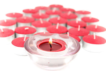 red candles on a white backgroundの写真素材