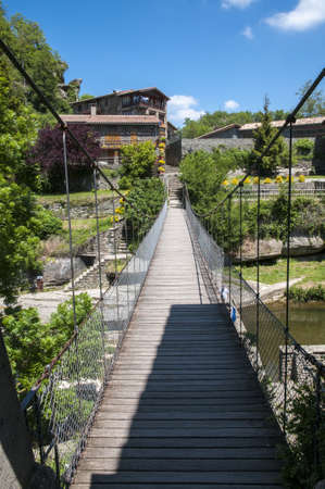 Rupit suspension bridge through which the river