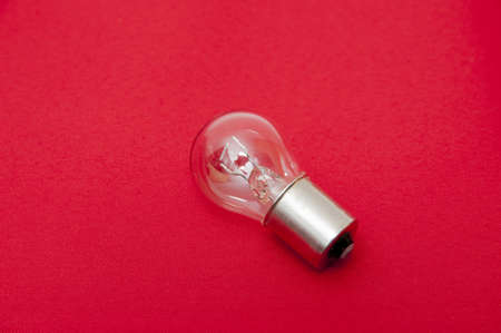 car bulb on a red background