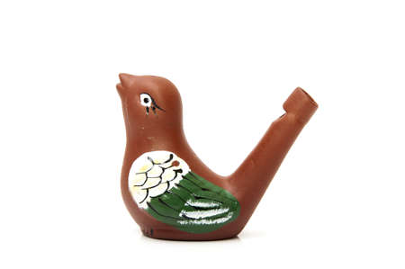 Whistling bird toy on a white backgroundの写真素材