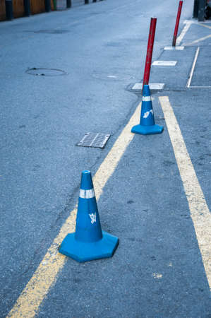 road with blue color cones to indicate the drawing