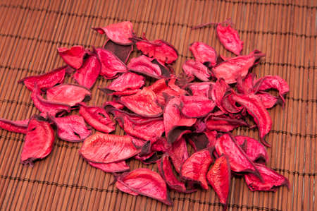 pink petals on a wooden backgroundの写真素材