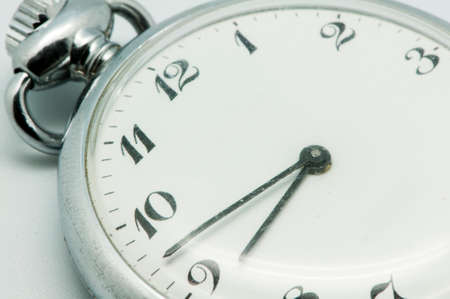 antique clock on a white backgroundの写真素材