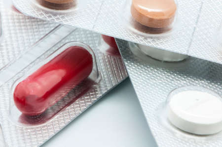 colorful pills on a white background