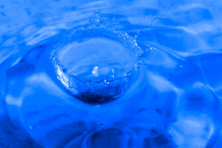 drop of water on a blue の写真素材