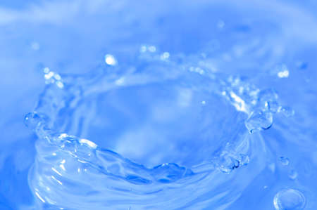 drop of water on a blue 