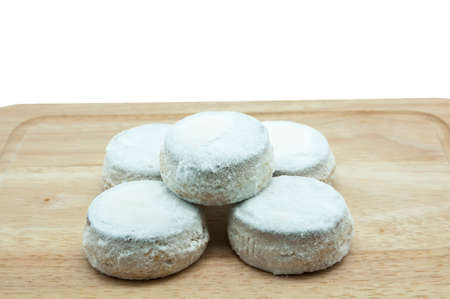 snowfall sugar cookies on a wooden backgroundの写真素材