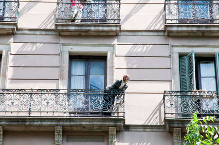 architectural building with people on balconies waxの写真素材