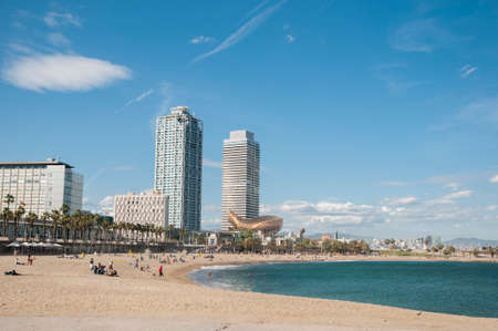 Barcelona beach where the big buildings observed nowadays の写真素材
