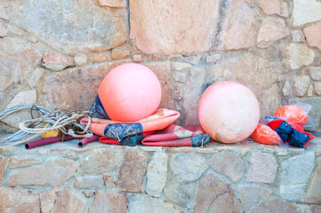 Round buoy boat for fishing netsの写真素材