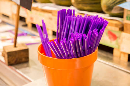 drinking straw lilac in a yellow vaseの写真素材