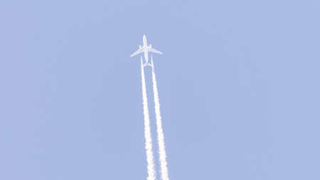 plane flying towards its destinationの写真素材