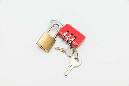 padlock with keys on a white backgroundの写真素材