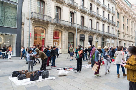 immigrants illegally selling products in Barcelona, Spain on 25/04/2015のeditorial素材