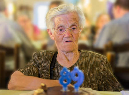 Happy birthday of a old lady with his 89th anniversaryの写真素材