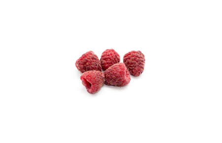 red raspberries on a white background