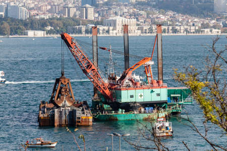 Dredger in operation in the Bosphorus Istambul, Turkeyの写真素材