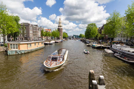 Canals of Amsterdam, capital city of the Netherlands with its traditional boatsのeditorial素材