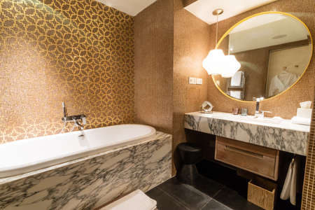 Luxury ensuite 5 star bathroom in bedroomのeditorial素材