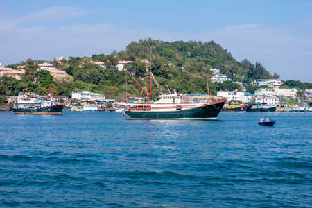 Fishing boats a harbor parked in the port in Hong Kong