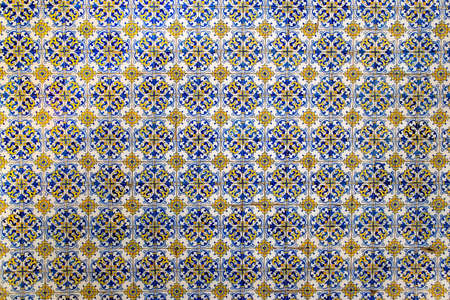 Colorful mosaic tiles on a wall as background