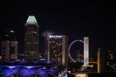 Night view Singapore Downtown, Marina Bay and Big Wheelのeditorial素材