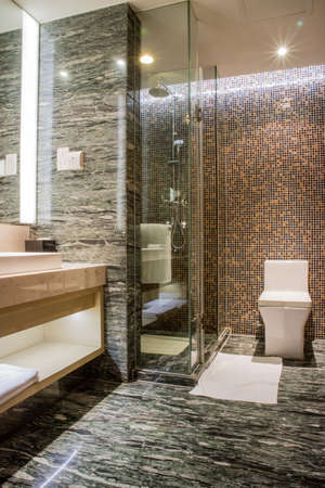Luxury ensuite 5 star bathroom in bedroomの写真素材