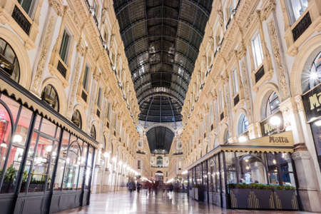 Beautiful Galleria Vittorio and Duomo Di Milano illuminated at night from Milan Italyのeditorial素材